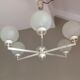 Six-light chrome metal chandelier and opaque glass globes / vintage 60s and 70s