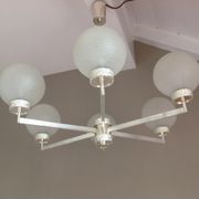 Six-light chrome metal chandelier and opaque glass globes / vintage 60s and 70s