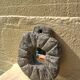 Brutalist mirror in hand-carved natural stone