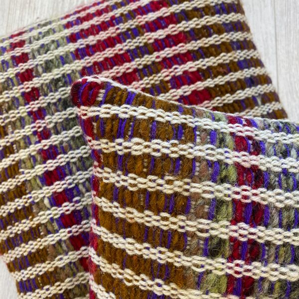 Paire de coussins en tissage de laine
