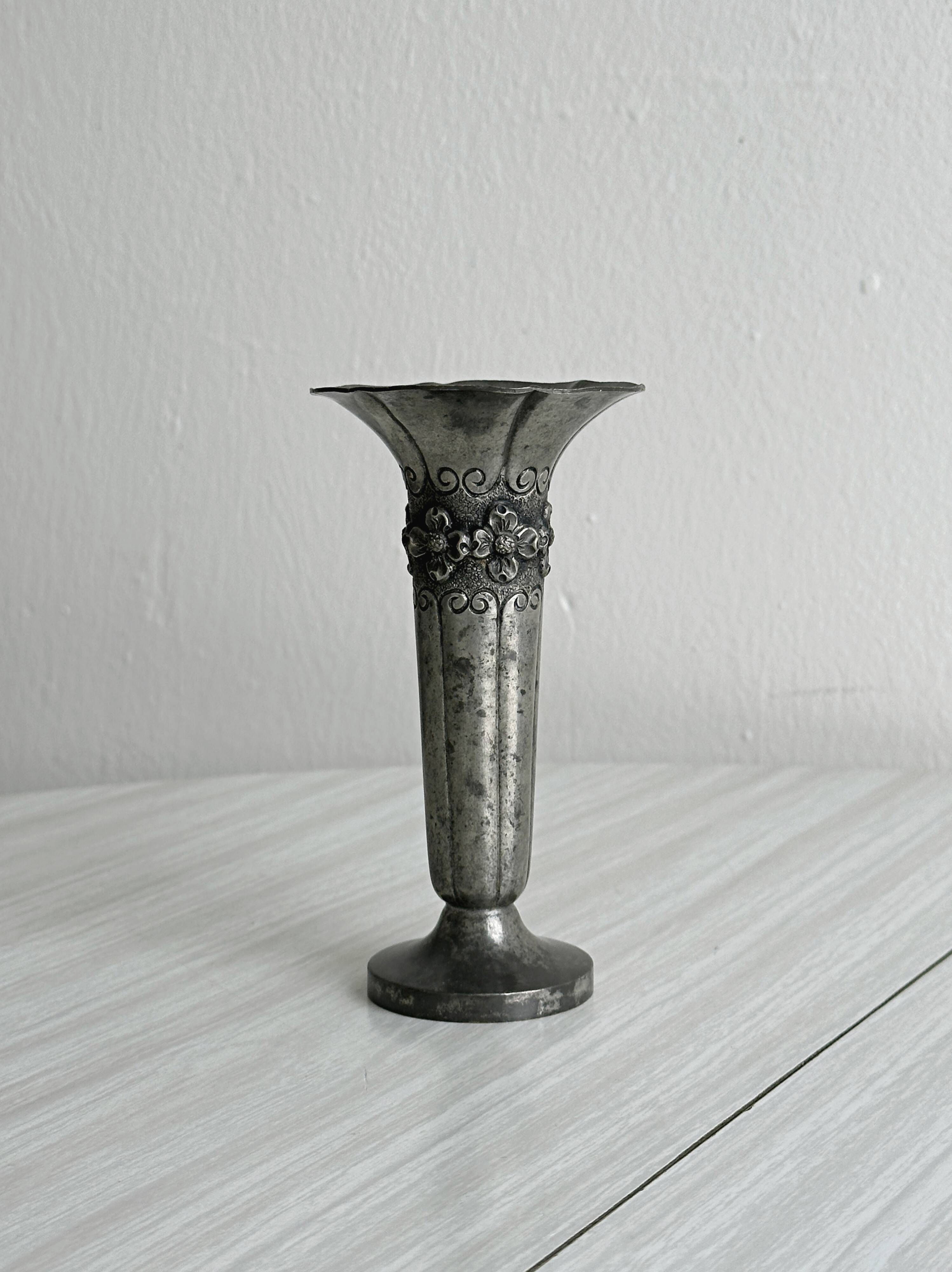 Patinated metal vase