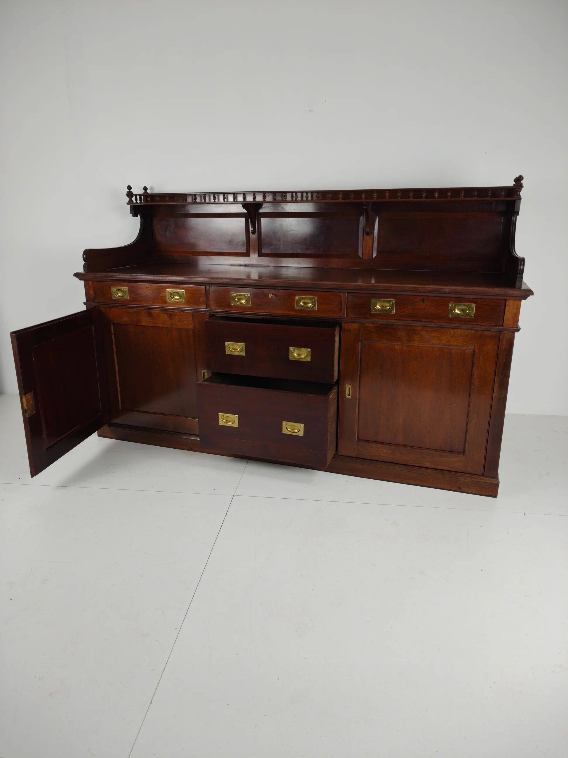 Early 20th-century English mahogany dresser / sideboard – brass campaign hardware