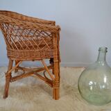 Child in rattan & Wicker Chair