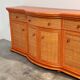 Vintage rattan & wood orange curved sideboard, 1980s
