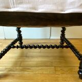 Fauteuil à haut dossier de style Louis XIII