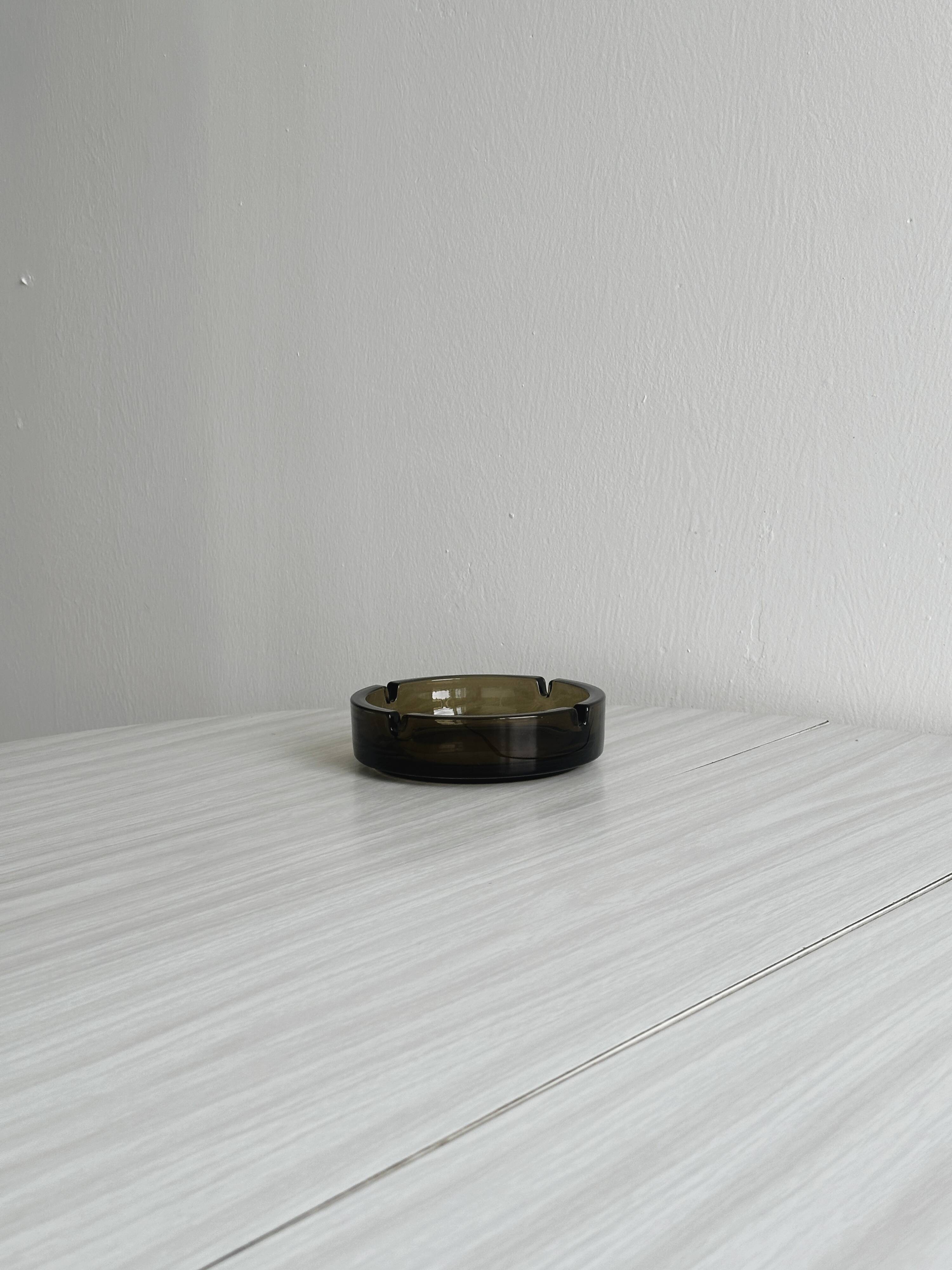 Thick smoked glass ashtray