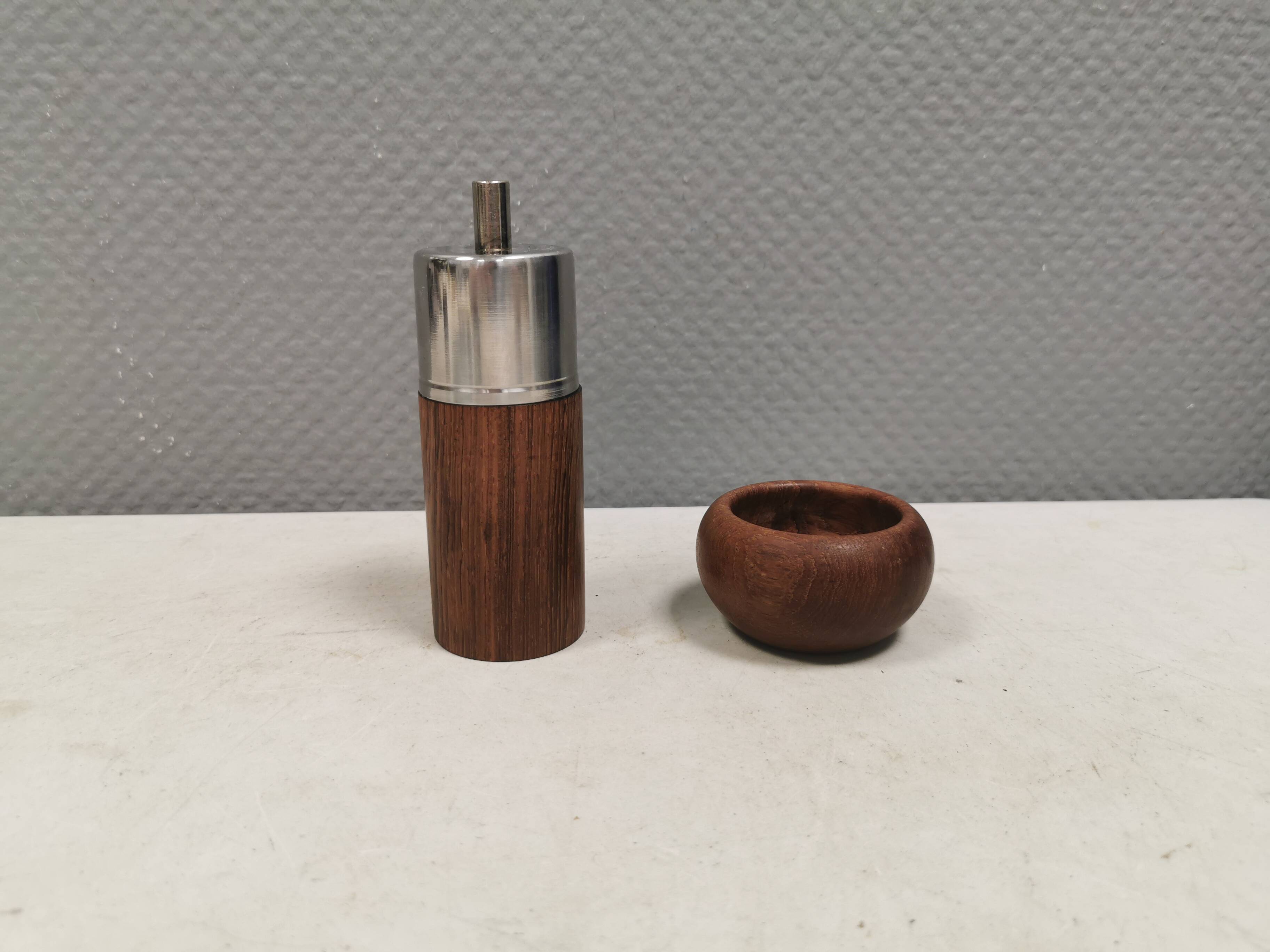 A salt shaker and a pepper mill in teak, made in Denmark 1960-70s