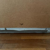 Large antique baroque mirror with angel decorations.