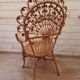 Fauteuil peacock en rotin des années 60