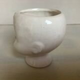 Baby doll shaped vase planter