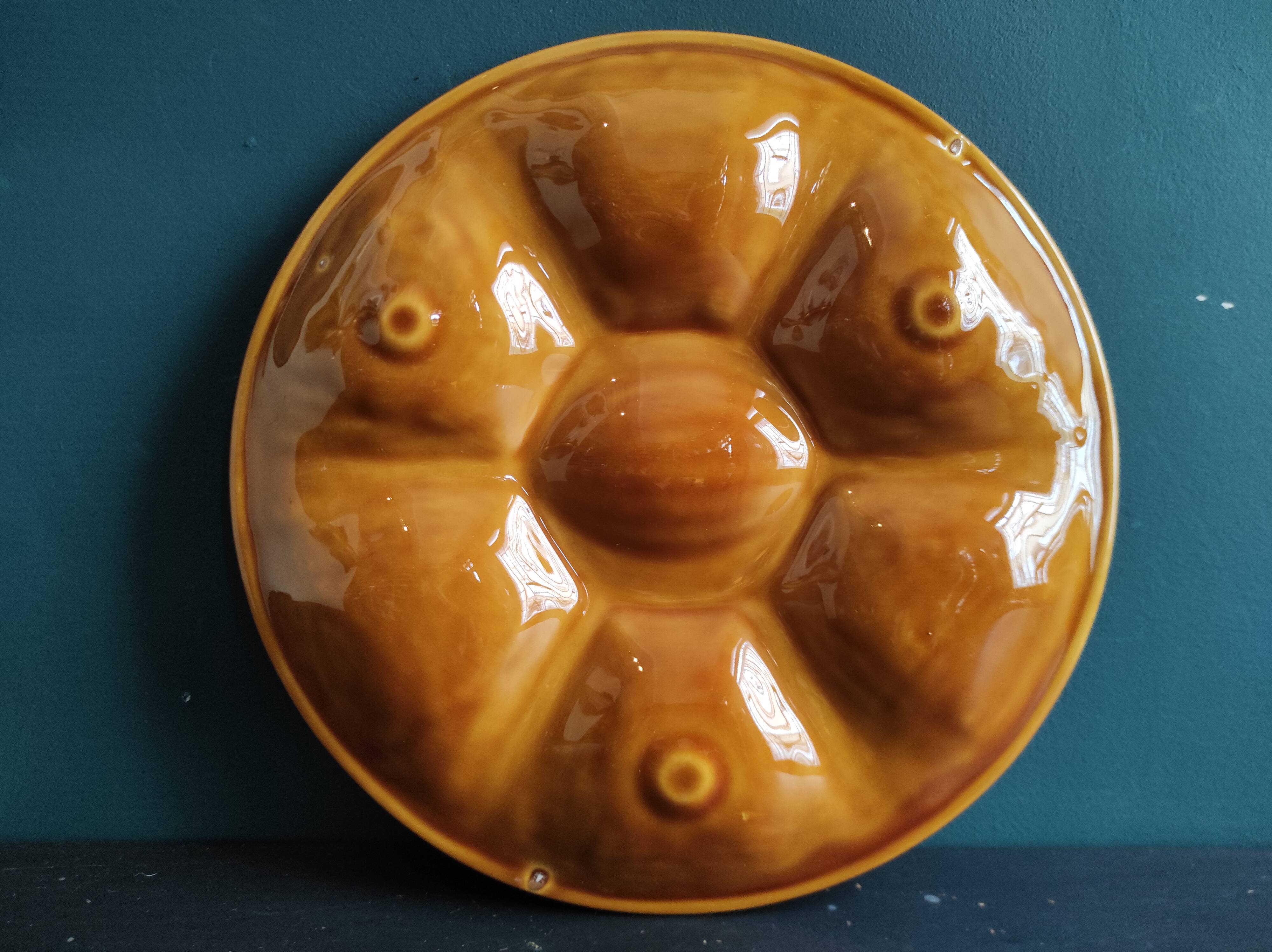 Vintage French amber oyster plate in Majolica decorated with fishes