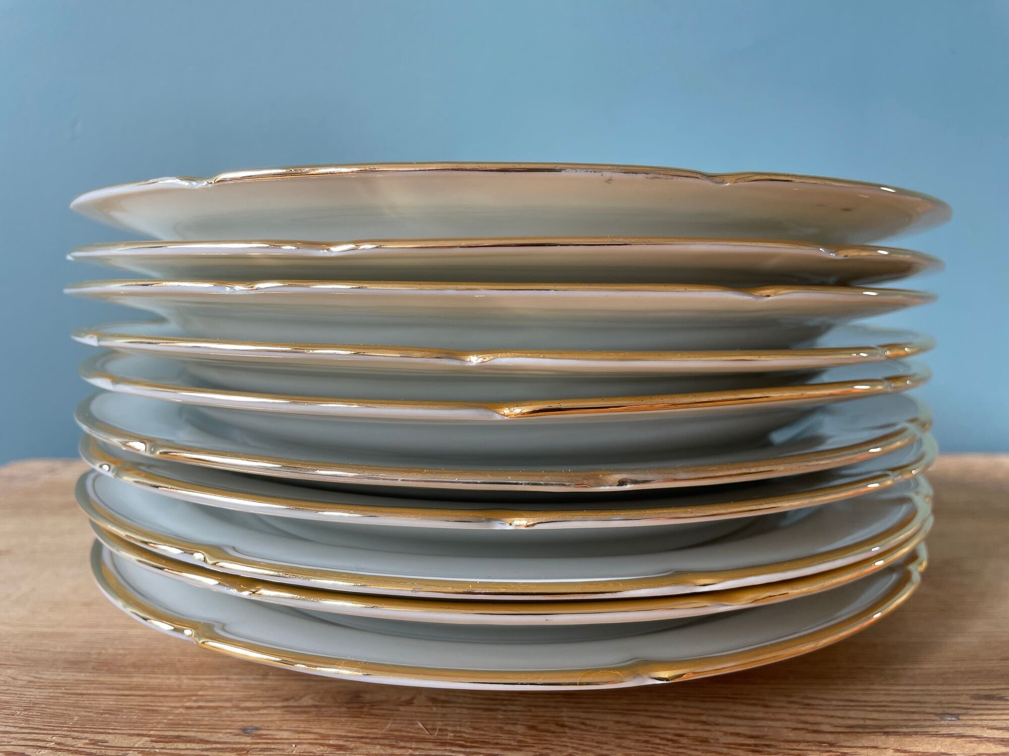 Series of 10 antique flat plates in Limoges porcelain