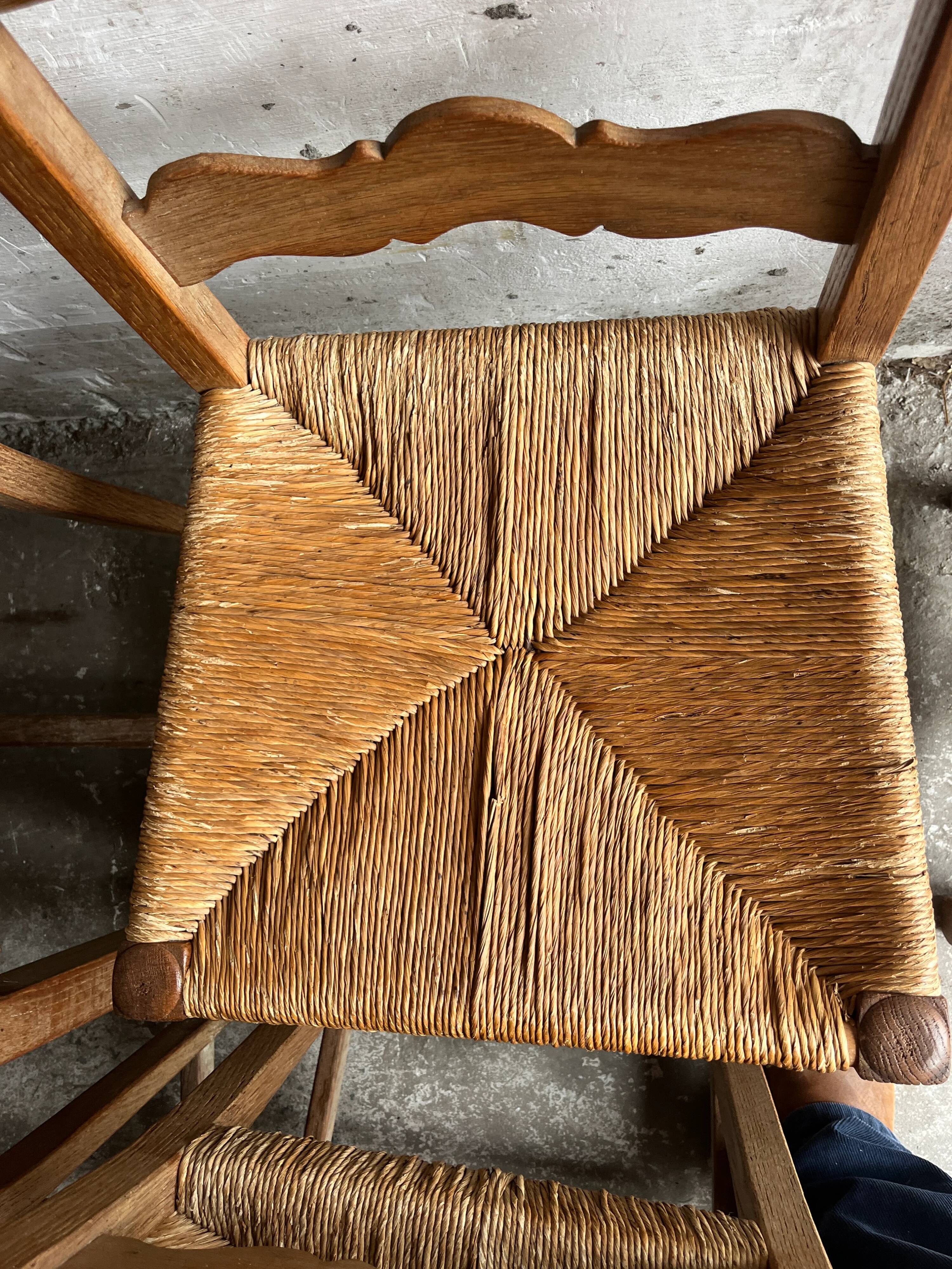 Set of 6 sculpted oak chairs with straw seats – 1950s