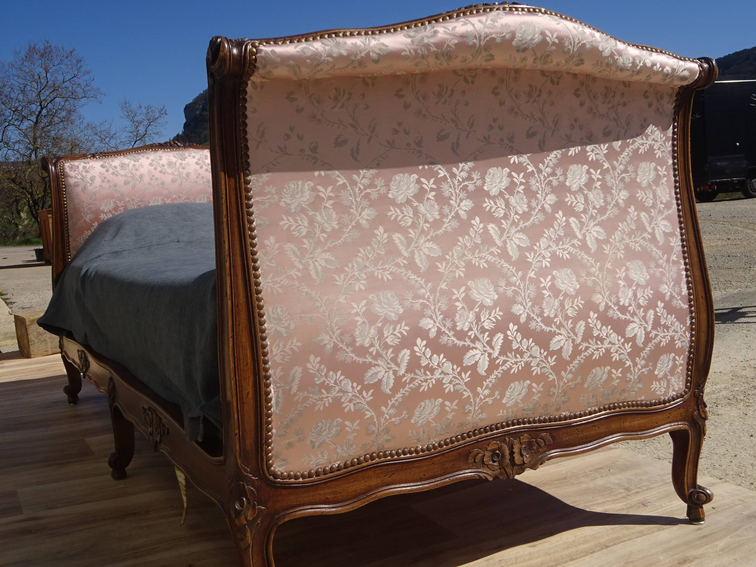 Antique sofa bed, in Louis XV style.