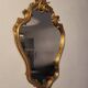 Miroir en bois d'or à  l or,style Louis 15
