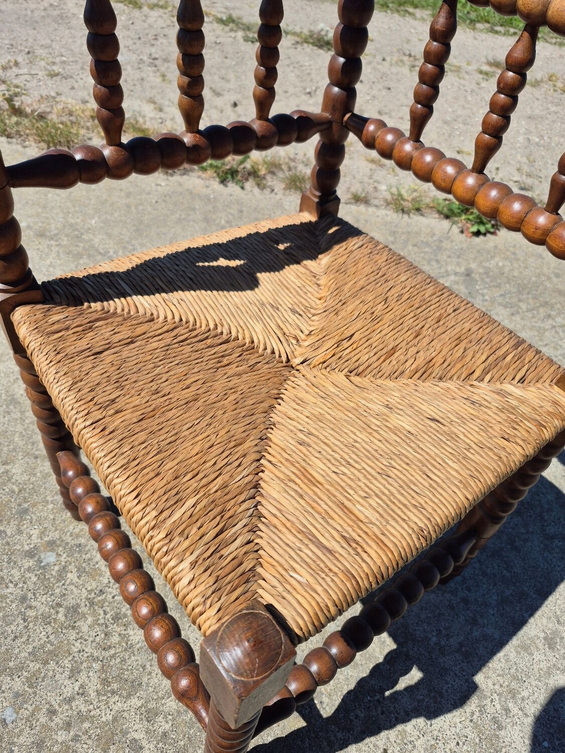 Vintage Dutch rustic corner chair bobbin turned oak with rush seating