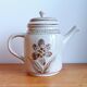 Antique coffee pot in handcrafted stoneware
