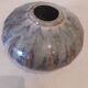 Globe vase, narrow neck, wide body.