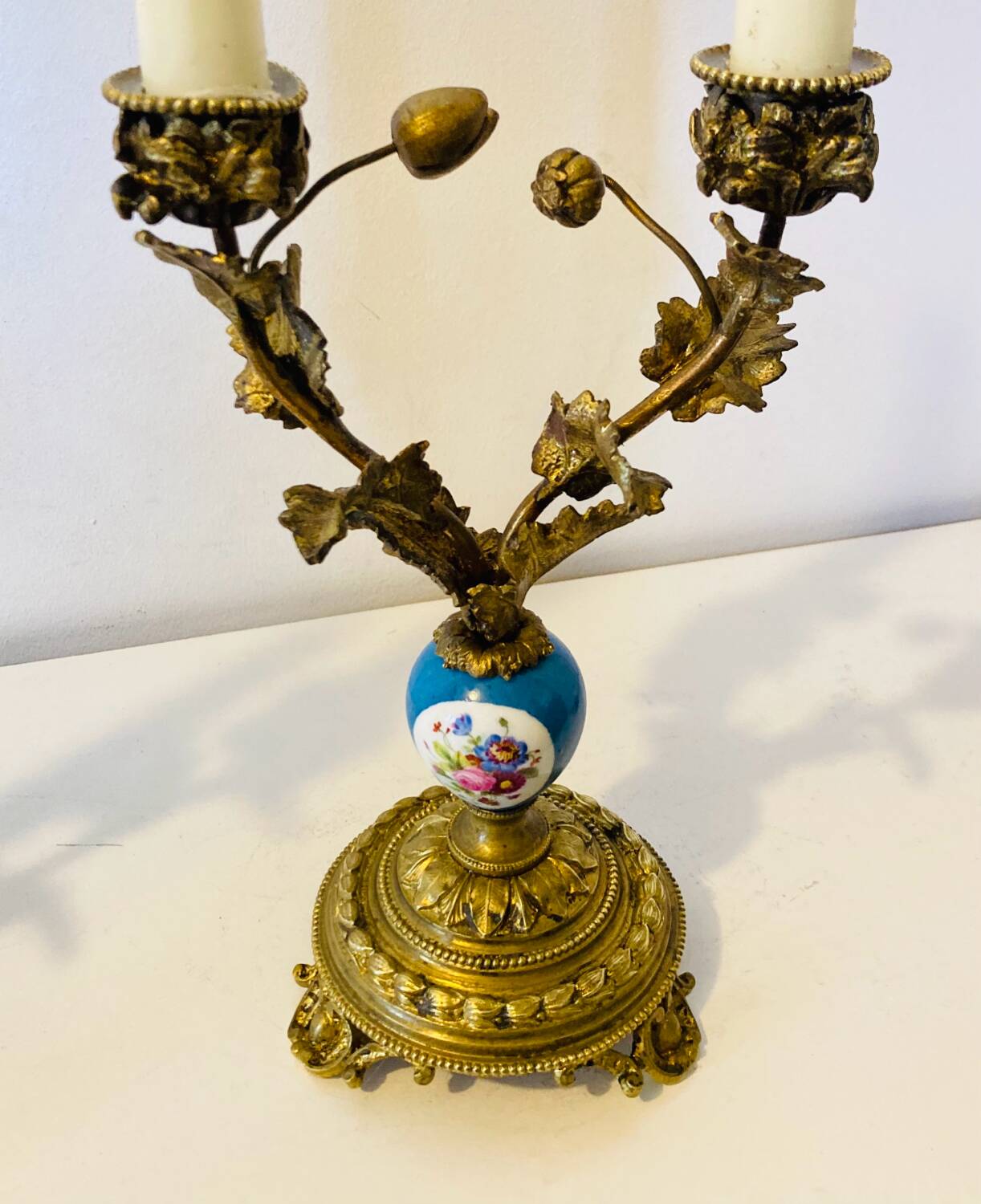 19th century candle holders in gilded bronze and porcelain