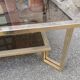 Table basse à deux niveaux verre et laiton