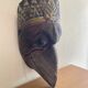 Grand traditional Indonesian mask carved from wood.