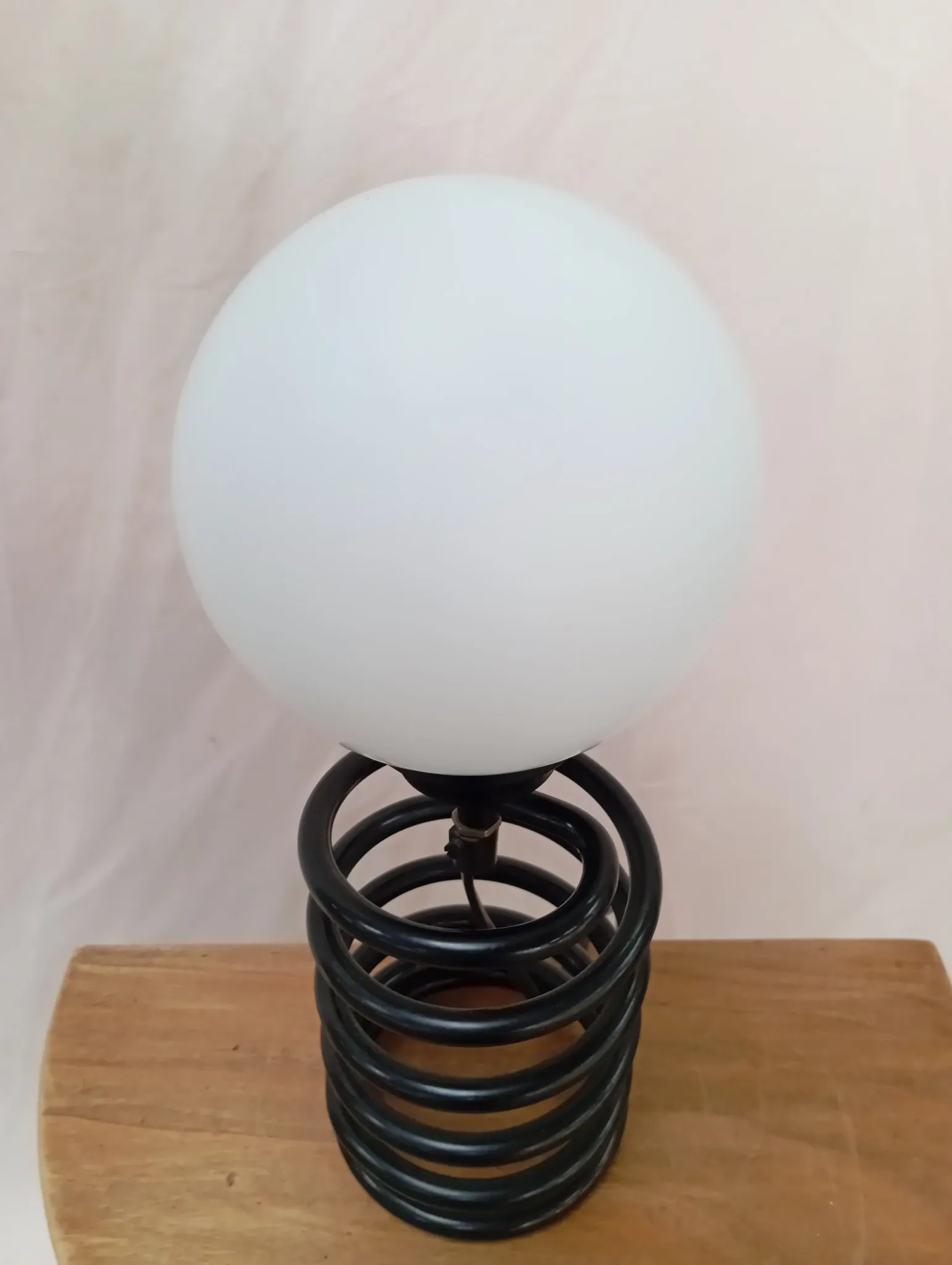 Spring lamp from the 1980s, design by Ingo Maurer.
