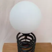 Spring lamp from the 1980s, design by Ingo Maurer.