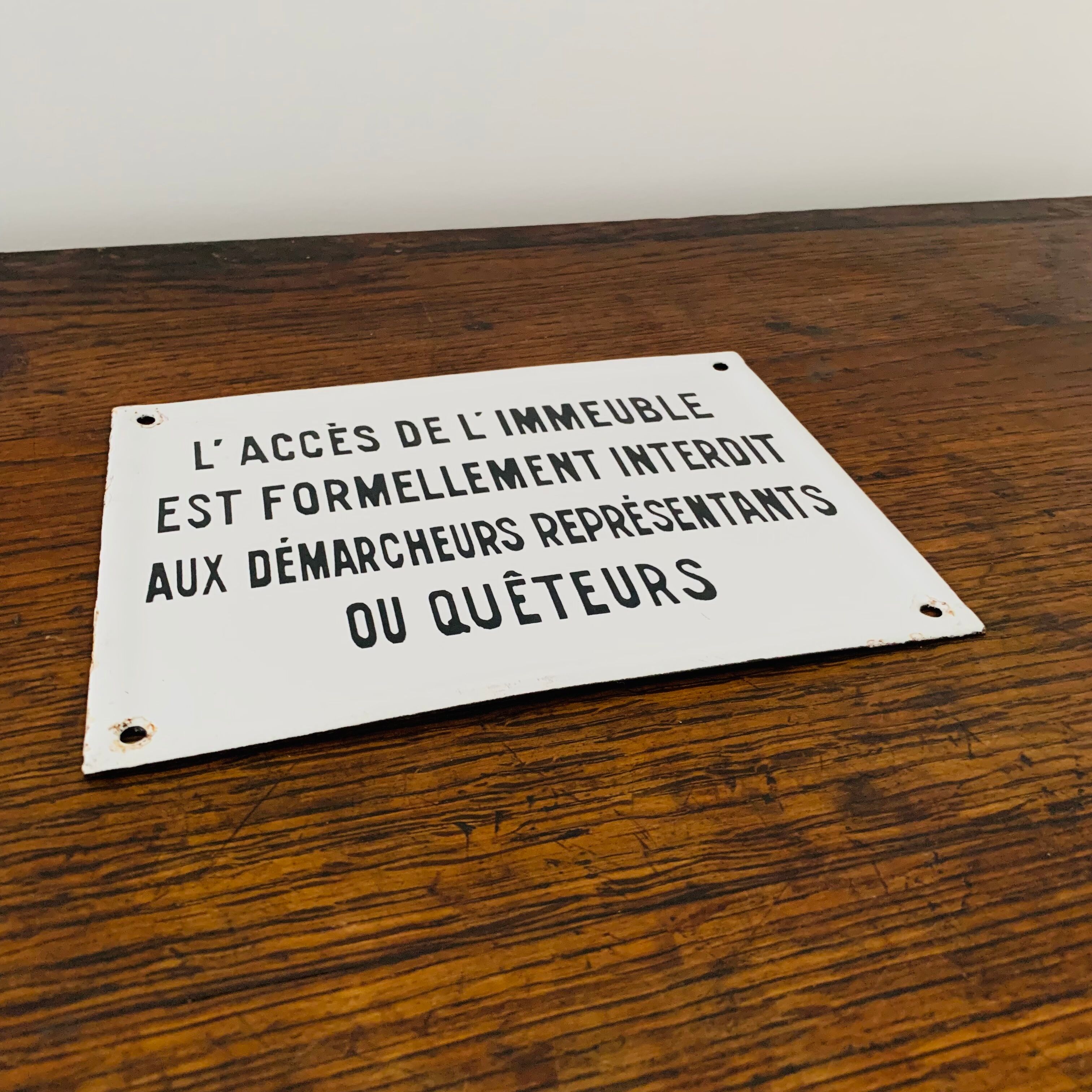 Old enamelled plaque of building