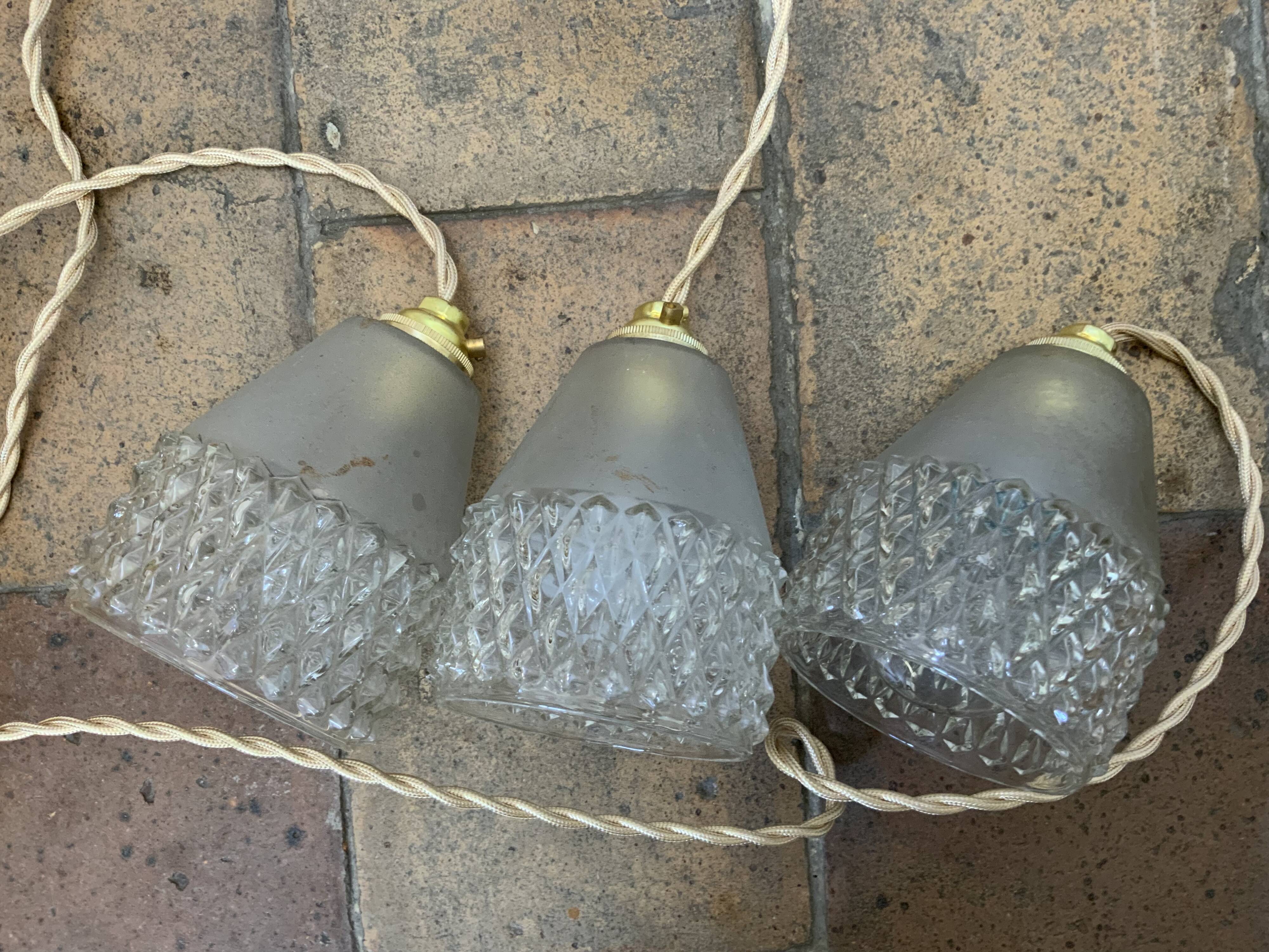 Trio of vintage suspensions