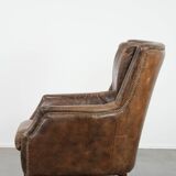 Very comfortable vintage cow leather armchair with character