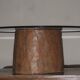 Carved antique tree stump coffee table with circular glass top