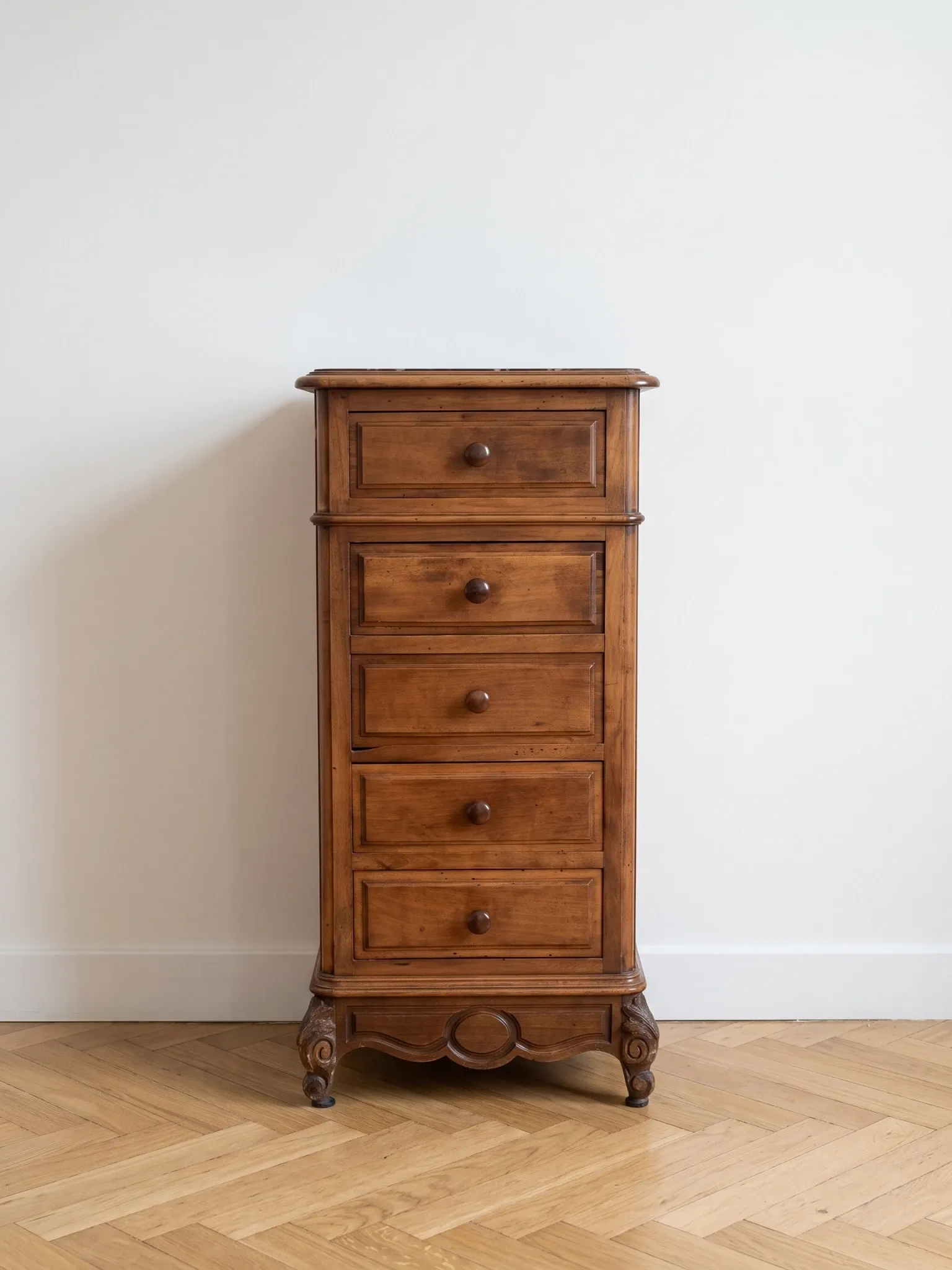 Antique wooden and marble chest of drawers.