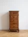 Antique wooden and marble chest of drawers.