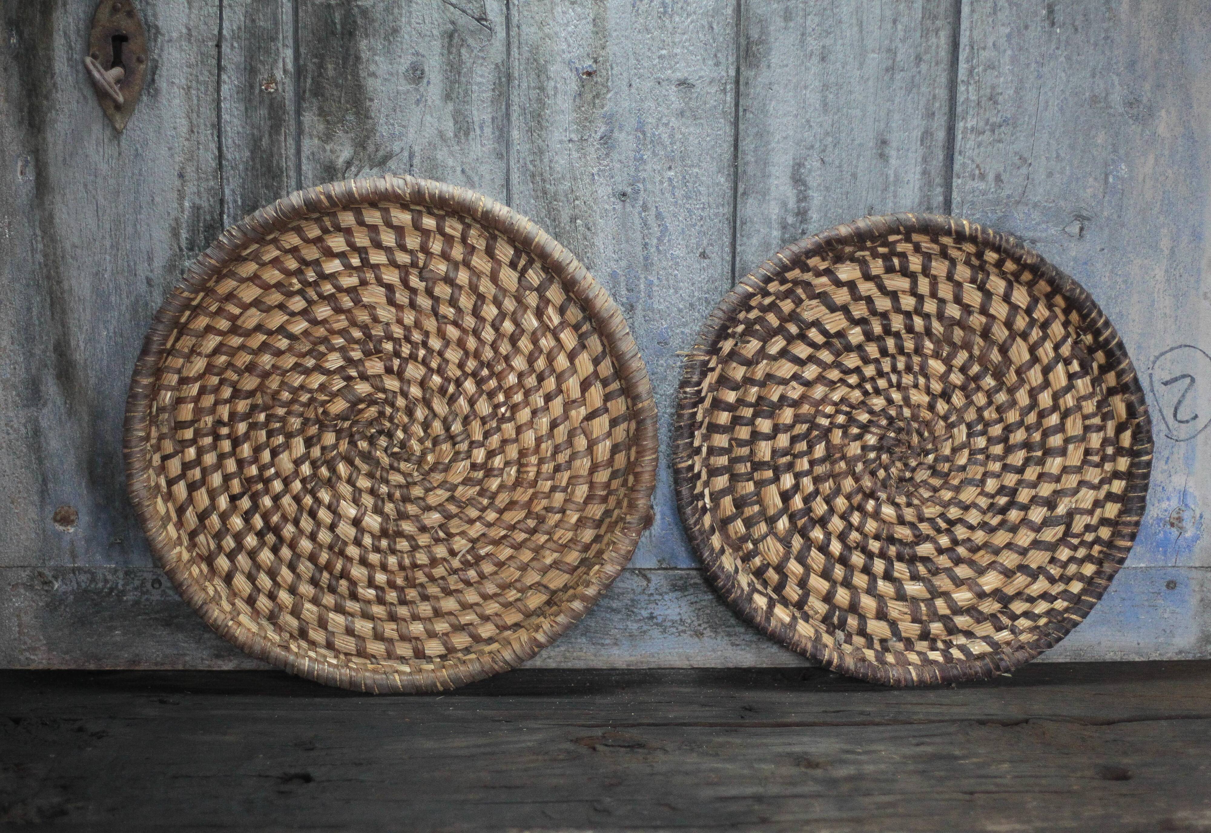 pair of old wicker trays, straw bourgne and bramble, woven bowl