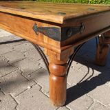 Medieval-inspired red oak coffee table with ironwork