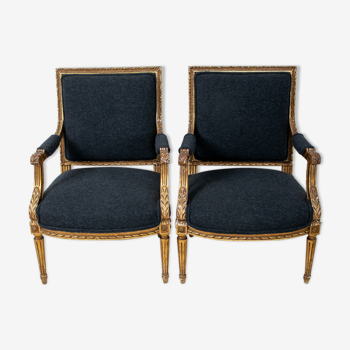 Pair of 19th century Louis XVI gilt armchairs newly re upholstered in holland and sherry fabric