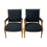 Pair of 19th century Louis XVI gilt armchairs newly re upholstered in holland and sherry fabric