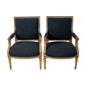 Pair of 19th century Louis XVI gilt armchairs newly re upholstered in holland and sherry fabric