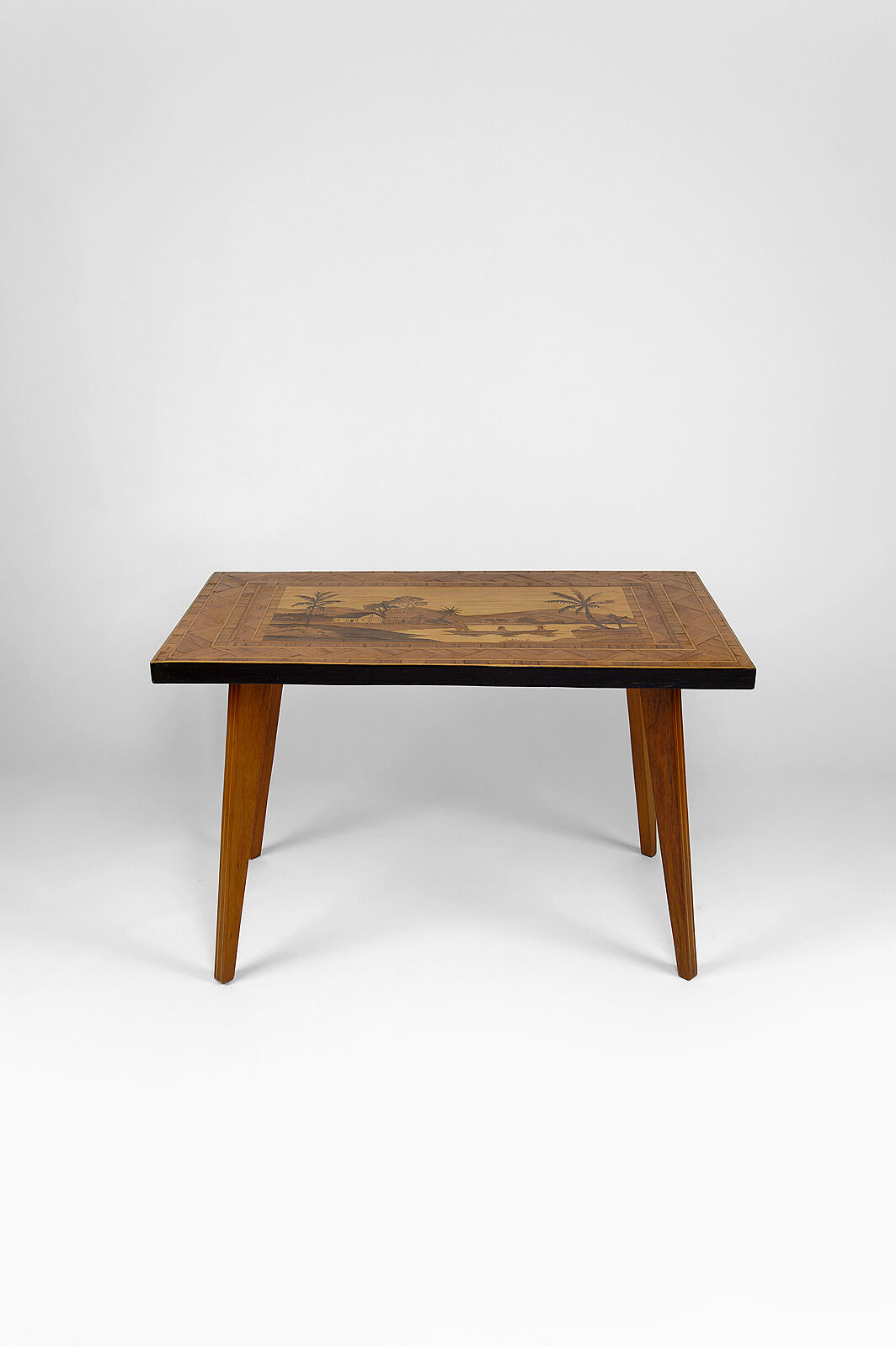 African Midcentury coffee table in inlaid wood, circa 1960