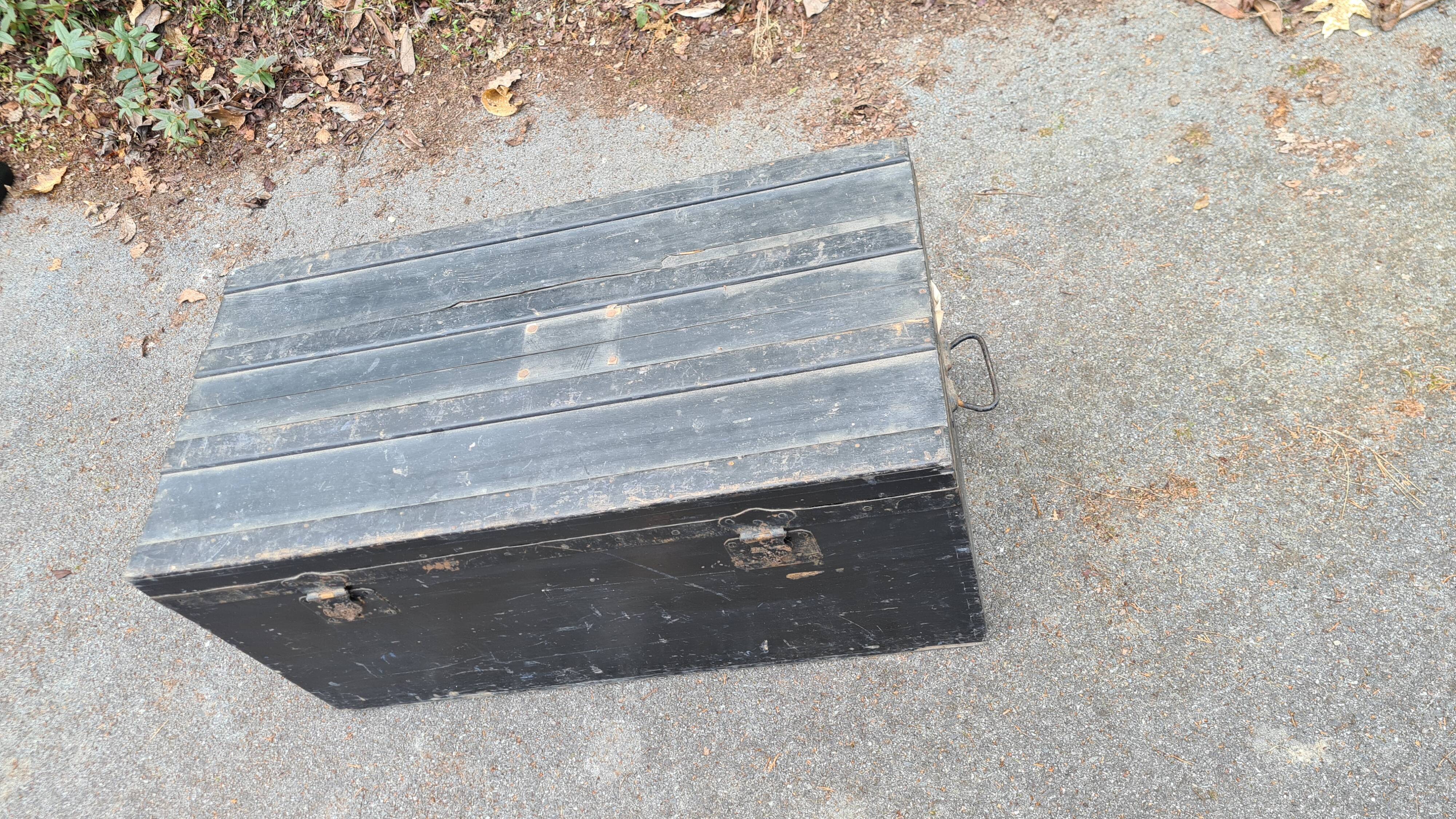 Old wooden trunk with interior compartments