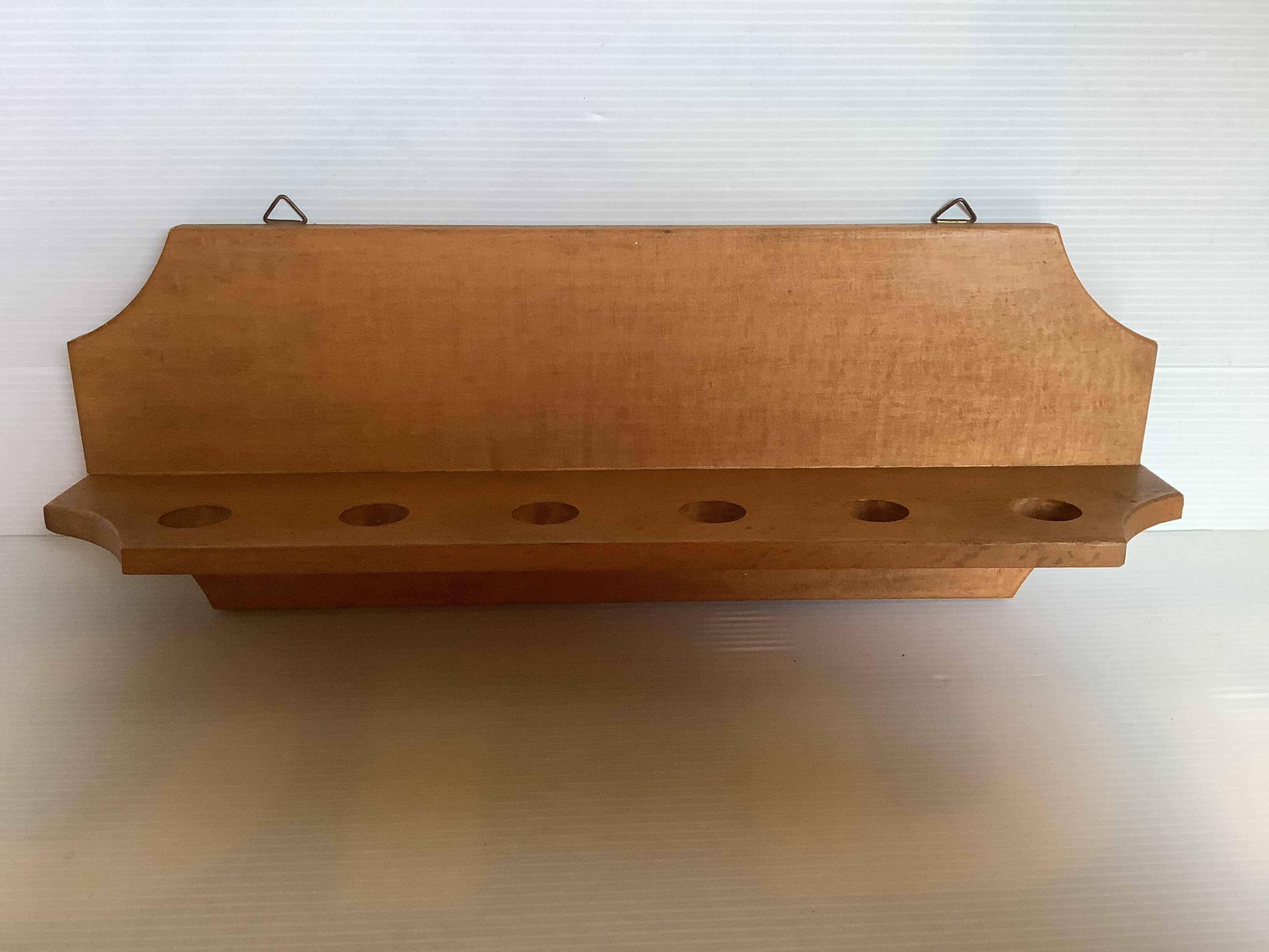 Wooden wall pipe door