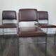Lot de 4 chaises fauteuil en skaï marron année 1970