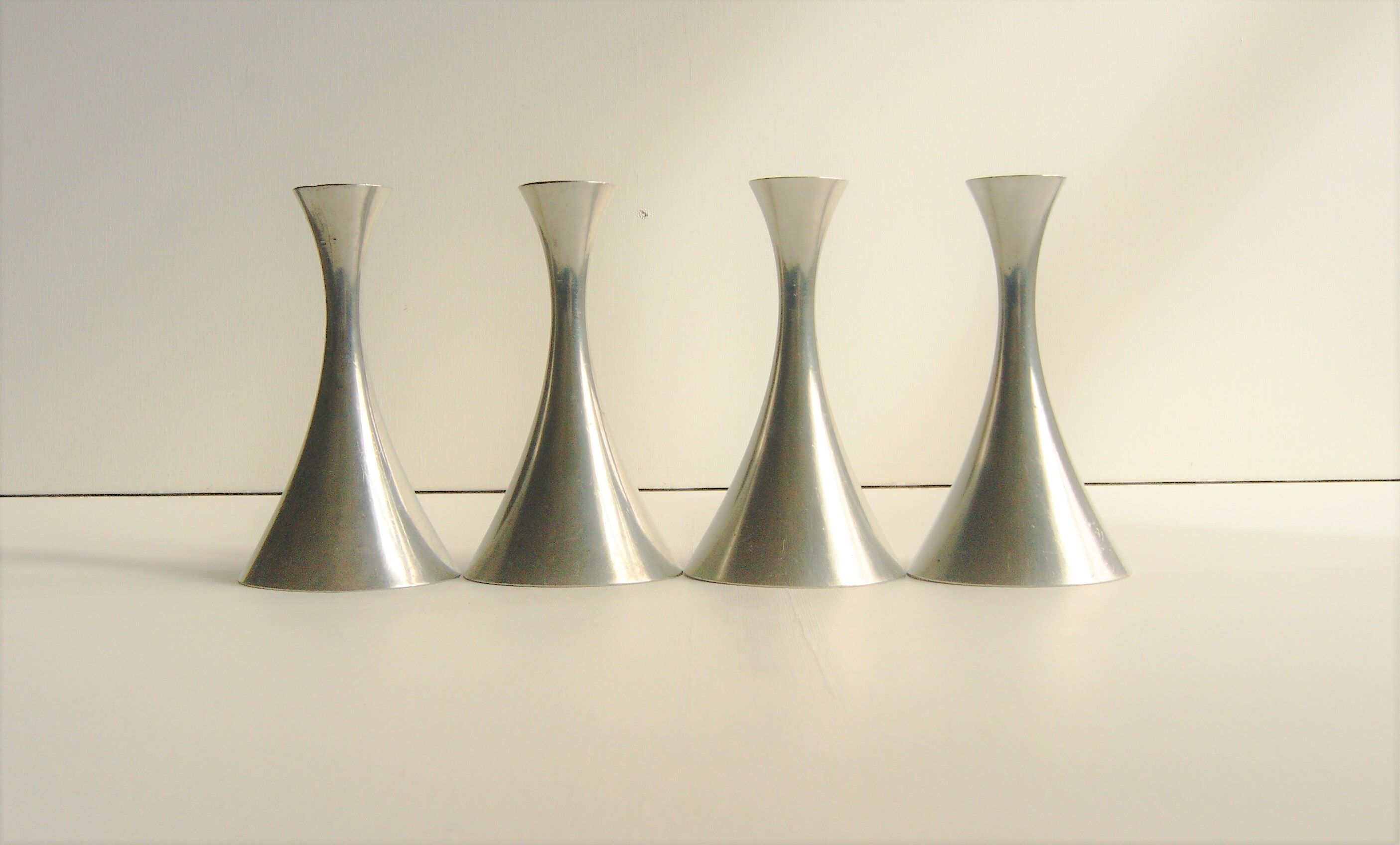 Set of 4 Art Deco candle holders by Just Andersen from the 1940s - fine elegant minimalist design.