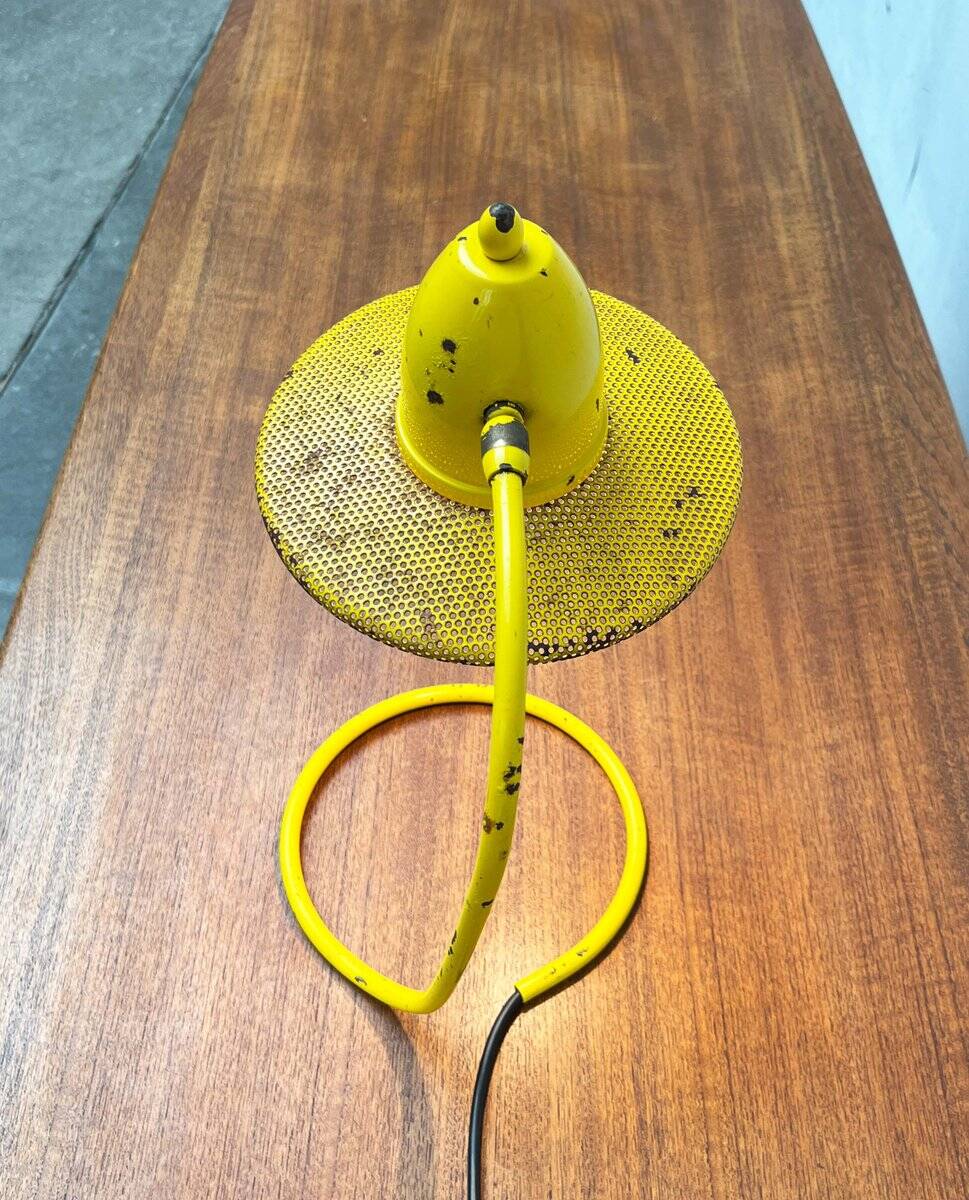 Perforated metal table lamp in Mid-Century Modern style, in the style of Mathieu Matégot, 1960s.
