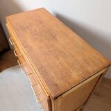 Vintage chest of drawers with checkerboard and compass feet
