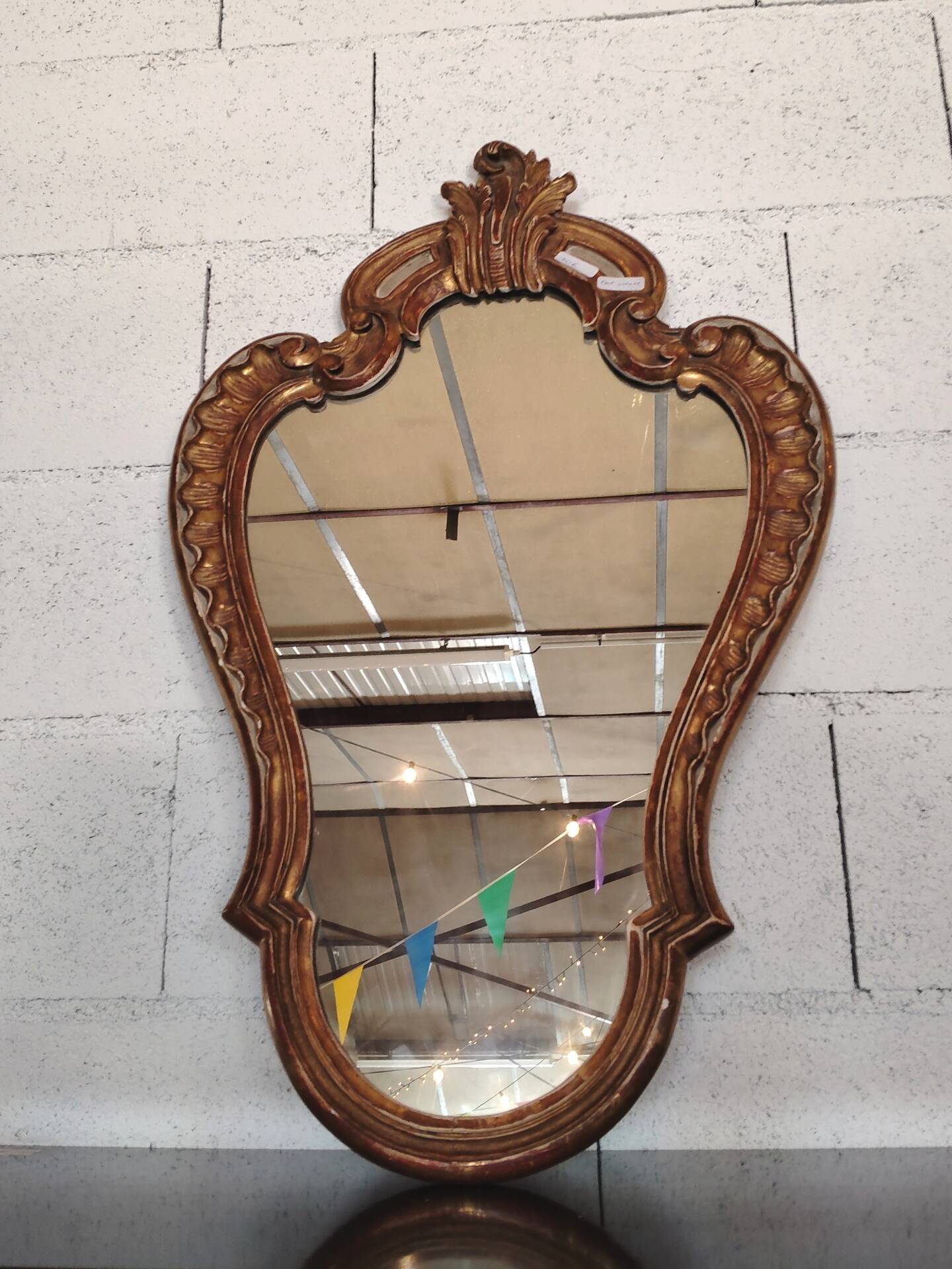 Rococo Style Mirror in Gilded Wood with Sculpted Pediment