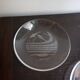 Hermès pair of glass plates with a dolphin pattern.