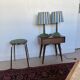 Pair of vintage wooden lamps with their striped beige, blue, and green shades.