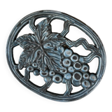 Oval enamelled cast iron trivet