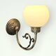 Pair of Napoleon III style brass and opaline wall lights